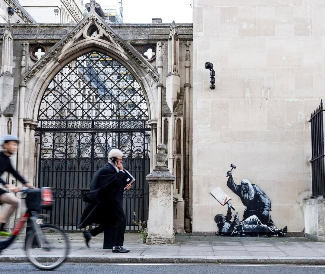 Before removal — Banksy mural visible
